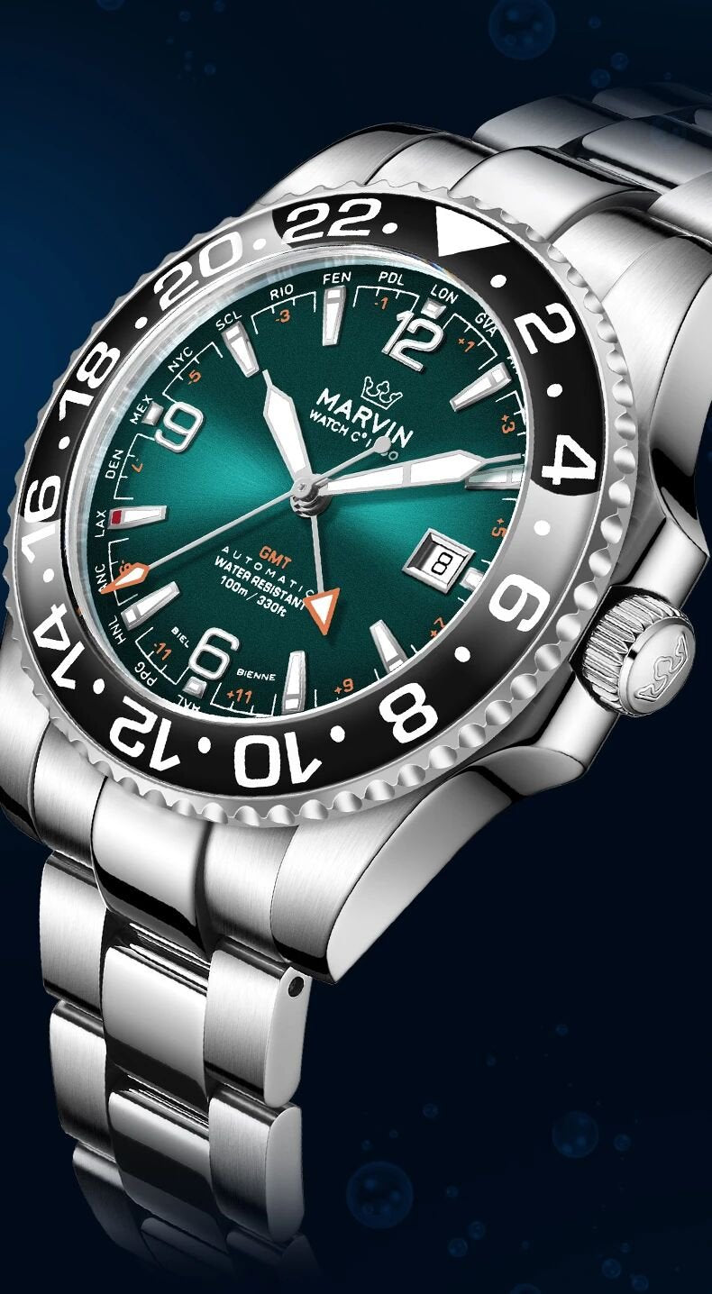 Angled Peacock Green Malton Diver GMT showing the ceramic bezel, GMT hand and bracelet finishing