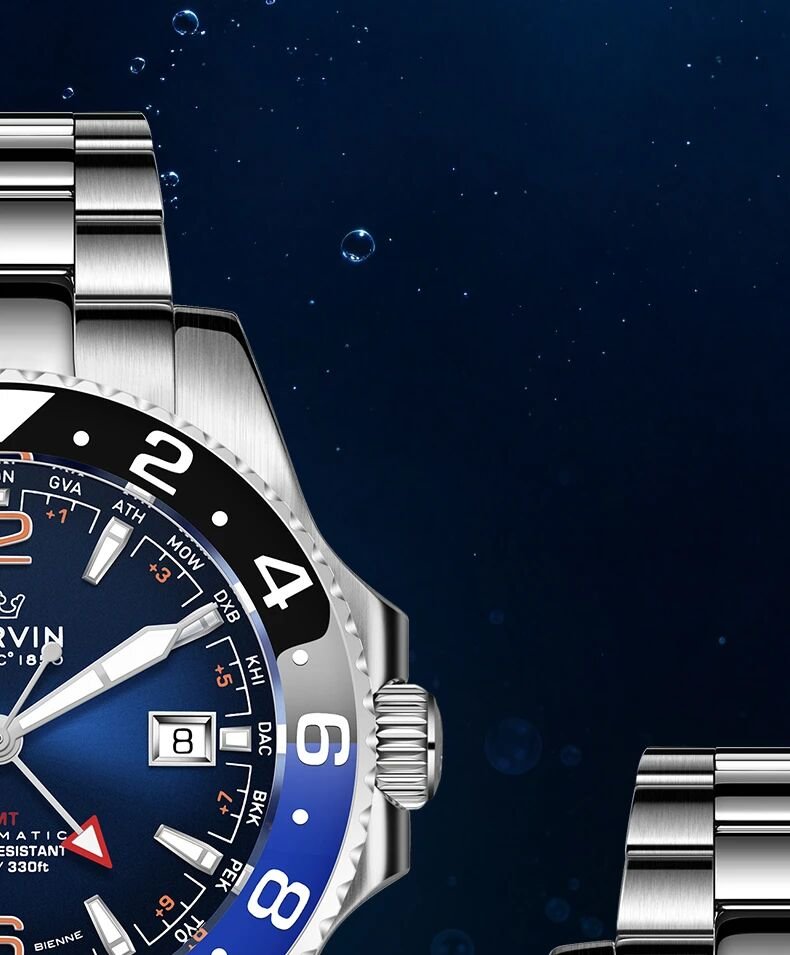Close-up of the Deep Sea Blue dial, GMT hand, crown and ceramic bezel