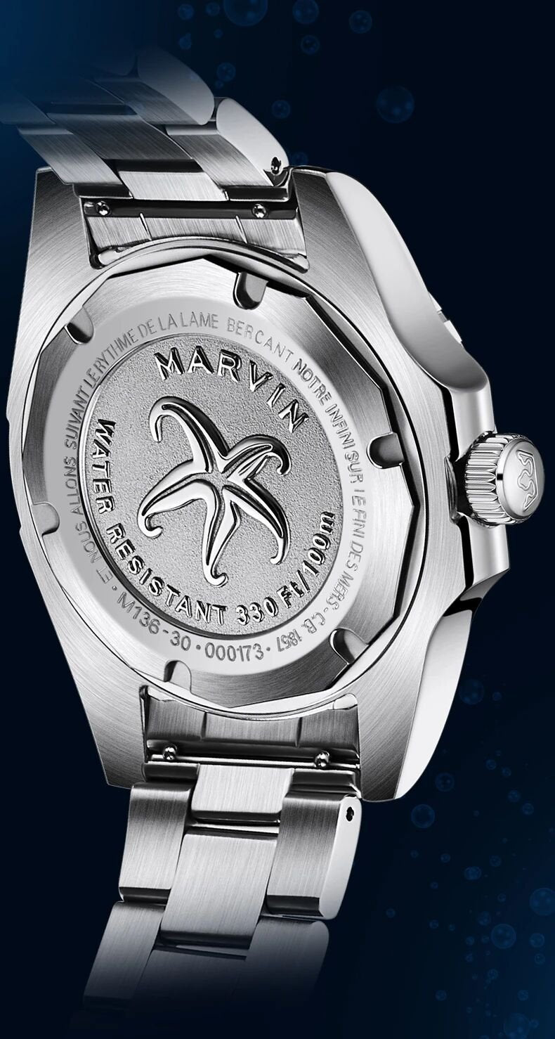 Stainless-steel caseback engraved with Marvin’s sea-creature emblem