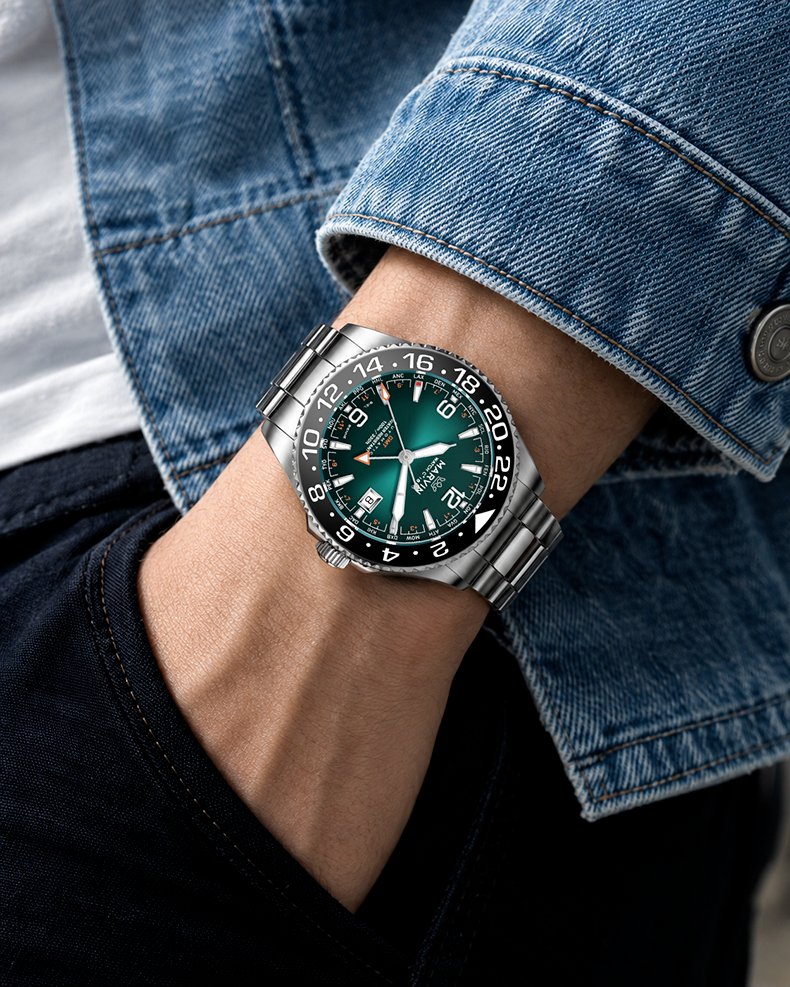 Peacock Green Malton Diver GMT worn with a blue denim jacket